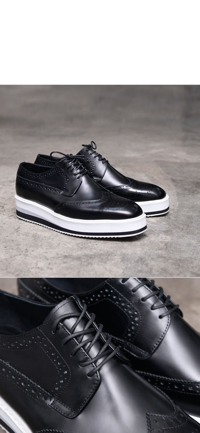 black leather sneaker with white sole